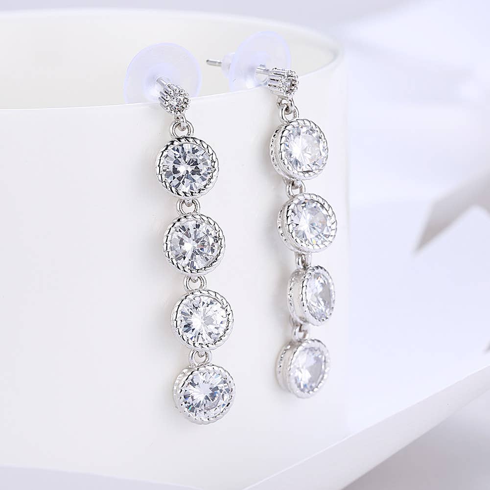Swarovski Crystal Four Drop Circular Dangling Earrings: Silver