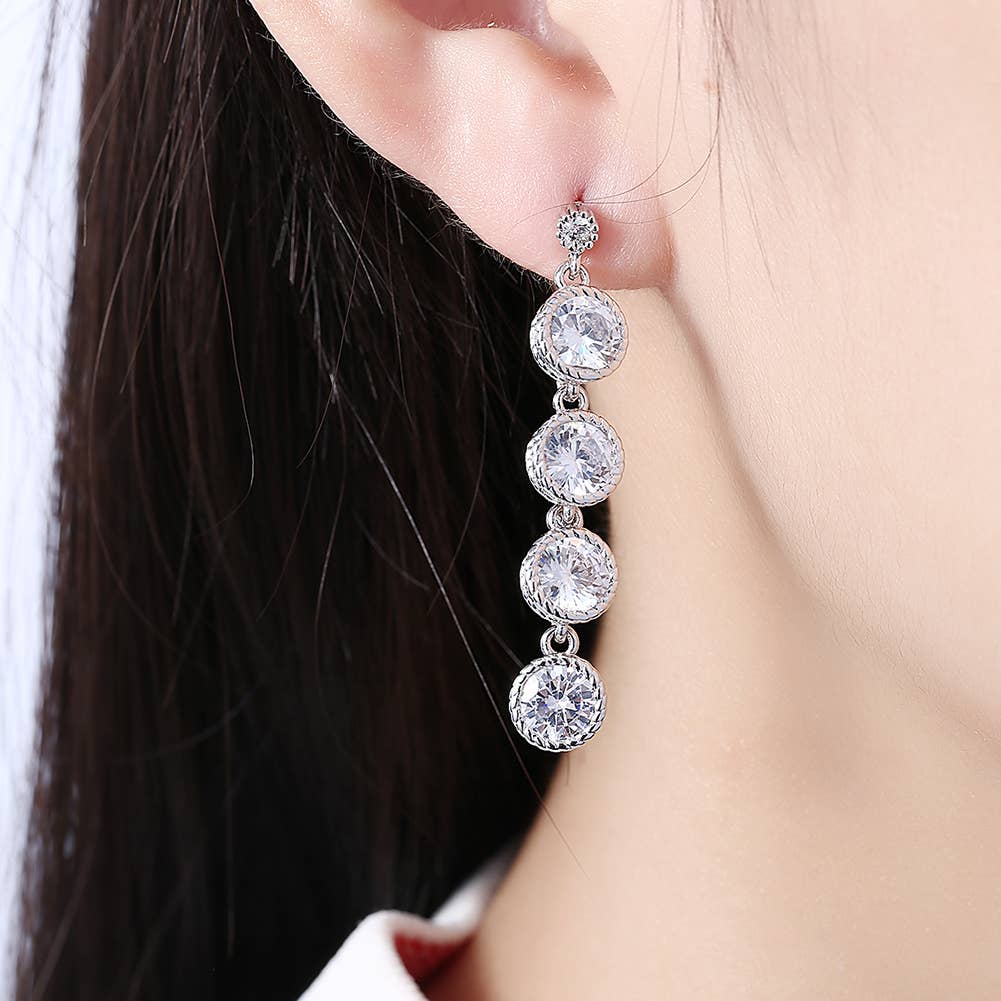 Swarovski Crystal Four Drop Circular Dangling Earrings: Silver