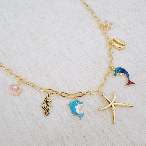 Ocean Play Charm Necklace Dolphin, Starfish Shell — product image